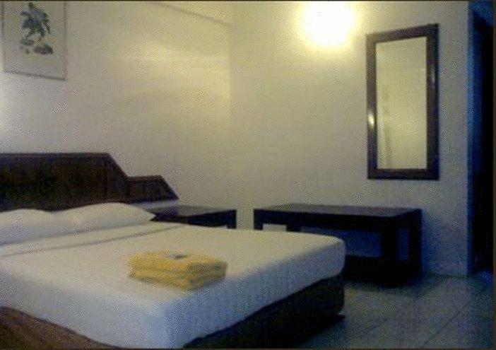 Palace Inn Miri Quarto foto